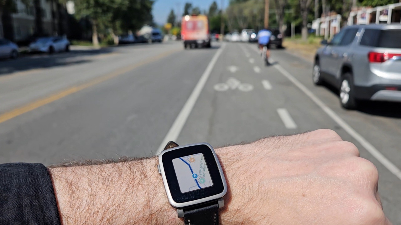 MirrorMap navigating on a Pebble Time Steel during a city bike ride, light map theme